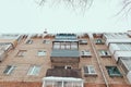 Russia. Terrible huge icicles formed on the balcony of a multi-storey building due to a poor roof storm system Royalty Free Stock Photo