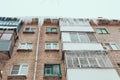 Russia. Terrible huge icicles formed on the balcony of a multi-storey building due to a poor roof storm system Royalty Free Stock Photo