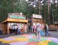 people tourists before entering the national park pay at the ticket office