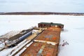 Russia, Troitskoe,March 21, 2021.Old ship with the inscription: Bagration, standing in the ice of the frozen Klyazma River, top