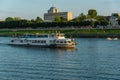 Russia, Tver region, August 2018. A small tourist ship with passengers sails past the pier in Tver