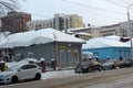 An old wooden house on the city street in winter Royalty Free Stock Photo