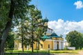 Russia, Uglich, July 2020. The magnificent building of the Epiphany Church among the trees of the city park.