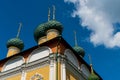 Russia, Uglich, July 2020. Numerous domes of the Epiphany Cathedral against the blue sky. Royalty Free Stock Photo