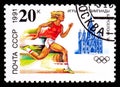 RUSSIA, USSR - CIRCA 1991: A postage stamp from USSR showing Runner at XXV Sport Olympics Games Barcelona 1992