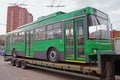 Transportation of trolleybus on the platform using tow tractors of KAMAZ truck in Vidnoe Royalty Free Stock Photo