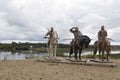 Russia, village Irbeyskoye, July 2019: sculpture Russian knights on the river Bank. hero of Russian epic