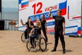 Russia, Vladivostok, 06/12/2018. Actors in wheelchairs and usual actors perform the dance on stage. Annual celebration Russia Day