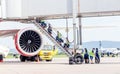 Russia, Vladivostok, 08/17/2020. Crew of airplane in official uniform and medical masks boarding to plane. Crew of plane. Aviation