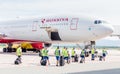 Russia, Vladivostok, 08/17/2020. Crew of airplane in official uniform of Rossiya Airlines goes to board of plane. Plane Boeing 777