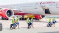 Russia, Vladivostok, 08/17/2020. Crew of airplane in official uniform of Rossiya Airlines goes to board of plane. Plane Boeing 777