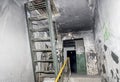 Russia, Vladivostok, 12/16/2017. Dirty interior of staircase in apartment building with very cheap apartments.