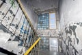 Russia, Vladivostok, 12/16/2017. Dirty interior of staircase in apartment building with very cheap apartments