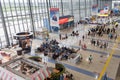 Interior view of Vladivostok International Airport. Many passengers waiting for boarding, cafe and stores Royalty Free Stock Photo