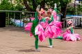 Russia, Vladivostok, 06/12/2018. Nice little girls in funny costumes of lotus flowers perform the dance on stage. Celebration of