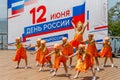Russia, Vladivostok, 06/12/2018. Nice little girls in funny costumes perform the dance on stage. Celebration of annual Russia Day