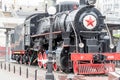 Russia, Vladivostok, 07/06/2019. Old train locomotive as monument on the platform of railway station Vladivostok. This monument is Royalty Free Stock Photo