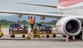 Passenger airplane Boeing 737 of T `way Air prepares for departure. Engineers check aircraft systems. Service and maintenance