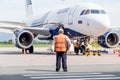 Russia, Vladivostok, 08/17/2020. Passenger jet Airbus A319 of Aurora Airlines check before taking off. Plane maintenance and