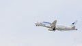 Russia, Vladivostok, 08/17/2020. Passenger plane Sukhoi Superjet 100 SSJ 100-95B of IrAero company in a sky. Russian airlines