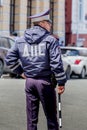 Russia, Vladivostok, 05/09/2018. A policeman watches people in city downtown during annual Victory Day on May`9