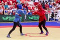 Russia, Vladivostok, 06/30/2018. Women self-defence show. Fighters in protective helmets box against each other. Wrestling,