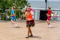 Russia, Vladivostok, 06/12/2018. Young adorable girl in colourful clothes perform song on stage. Celebration of annual Russia Day