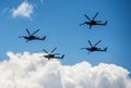 Russia, Voronezh - June 24, 2017. A group of Russian Air Force Mi-28 helicopters in the sky during demonstration performances Royalty Free Stock Photo