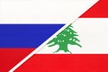 Russia vs Lebanon national flag from textile. Relationship and partnership between two countries