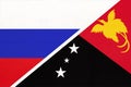 Russia vs Papua New Guinea, symbol of two national flags. Relationship between Asian and Oceanian countries