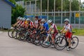 Russia. Vyborg 06.06.2021 Children cycling at the stadium in the summer