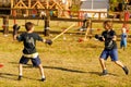 Russia. Vyborg. 08.21.2020. Children fight with wooden swords at a knight`s festival