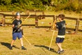 Russia. Vyborg. 08.21.2020. Children fight with wooden swords at a knight`s festival