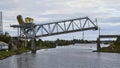 The railway bridge over the Shizhnya river is raised for the passage of the ship Royalty Free Stock Photo