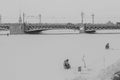 Russia, Winter St. Petersburg, Retro style photo, black and white photo. View of the palace bridge, an unusual angle. Soft dayligh
