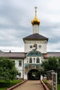 Russia, Yaroslavl, July 2020. Gate in the monastery wall, passage to the river.