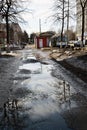 Russia, Yaroslavl-March 29.2016. Potholes on asphalt road filled with water