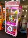 Russia Yaroslavl 21.02.2021 Pink slot machine with toys prizes in the children`s center