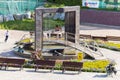 Krasnaya Gorka, Bazhov Mountain Park. Children reading a book on a summer day. Russian text: Riphean building machinery factory,