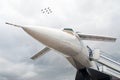 Russian airplane TU-144 and eight planes in sky Royalty Free Stock Photo