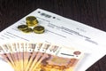 Russian annual tax Declaration of taxes of individuals. The Form 3-NDFL. A few Russian notes and coins are on the sheet of the Dec Royalty Free Stock Photo