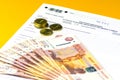 Russian annual tax Declaration of taxes of individuals. The Form 3-NDFL. A few Russian notes and coins are on the sheet of the Dec Royalty Free Stock Photo