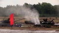 Russian army. Tanks T-90A (T90) and T-80U (T80) moving on the training ground.