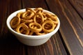 Russian bagels in ceramic bowl on dark rustic table Royalty Free Stock Photo