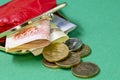 Russian banknotes and coins are scattered from the wallet. Royalty Free Stock Photo