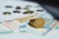 Russian banknotes rubles and a coin with a face value of 10 lie on a white surface. The concept of Economics Royalty Free Stock Photo