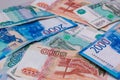 Russian banknotes scattered on the table, colorful colorful money close-up