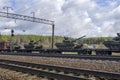 Russian tanks loaded onto a cargo railway platform