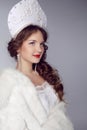 Russian Beauty. Attractive female wearing in kokoshnik. Woman's Royalty Free Stock Photo