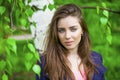 Russian beauty - Young brunette girl at a white birch Royalty Free Stock Photo